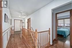 Gleaming hardwood floors greet you at the front do - 
