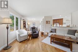 Living Room open to Dining Room and Kitchen - 