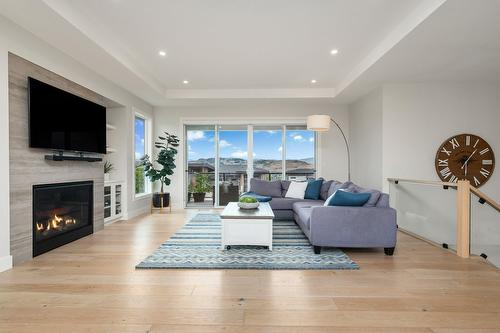 631 Mt Ida Crescent, Coldstream, BC - Indoor Photo Showing Living Room With Fireplace