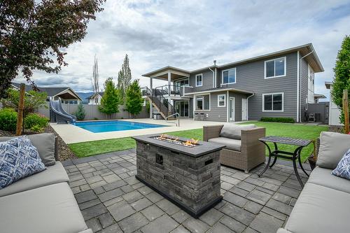631 Mt Ida Crescent, Coldstream, BC - Outdoor With In Ground Pool With Deck Patio Veranda