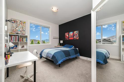 631 Mt Ida Crescent, Coldstream, BC - Indoor Photo Showing Bedroom