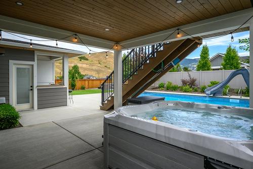 631 Mt Ida Crescent, Coldstream, BC - Outdoor With In Ground Pool With Deck Patio Veranda With Exterior