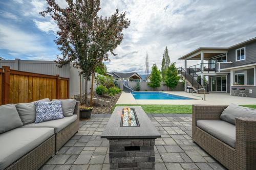 631 Mt Ida Crescent, Coldstream, BC - Outdoor With In Ground Pool With Deck Patio Veranda