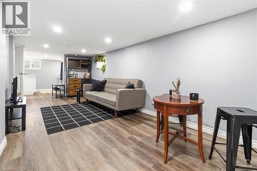 Downstairs living and dining room - 29 Wexford Avenue N, Hamilton, ON 