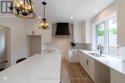 80 Herb Street, Norwich (Norwich Town), ON - Indoor Photo Showing Kitchen With Double Sink