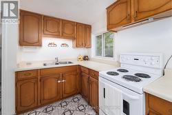 Functional kitchen has morning light - 