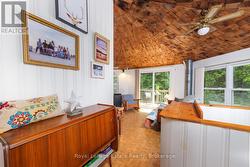with its thatched style ceiling... - 
