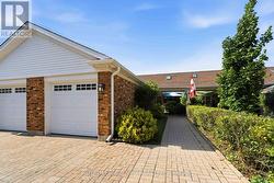 Single Detached Garage with Walkway to Condo - 