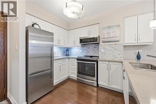 1276 Maple Crossing Boulevard Unit# 110, Burlington, ON - Indoor Photo Showing Kitchen With Upgraded Kitchen