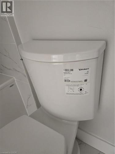 White contemporary toilet fixture - 3085 Kingsway Drive Unit# 21, Kitchener, ON 