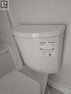 White contemporary toilet fixture - 