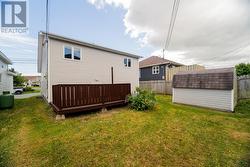 Backyard with storage shed - 