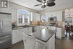 Kitchen Fridge, Sink and Island - 