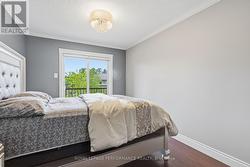 2nd floor bedroom with patio door to deck - 