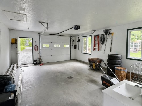 Garage - 127 Ch. Des Scouts, Val-D'Or, QC - Indoor Photo Showing Garage