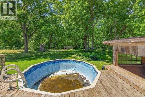 44 Sims Lock Road, Caledonia, ON - Outdoor With Above Ground Pool With Backyard