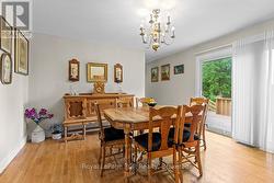Dining area with patio doors to large deck - 