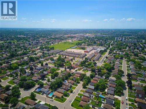 Aerial perspective showcasing an expansive residential area with detached and attached housing - 282 East 13Th Street, Hamilton, ON - Outdoor With View