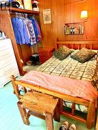 Principal bdrm has Pioneer Handicraft bed & table - 