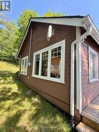 Wood exterior and several new windows - 