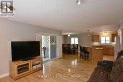 Living Area Open Concept with Patio Doors to Porch - 