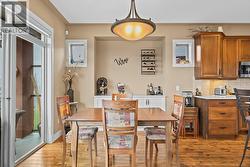 Dining area with sliding glass doors to balcony - 
