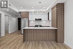 Welcome to 205 at Eminence! Photo of a similar floorplan/different colour scheme in building - 