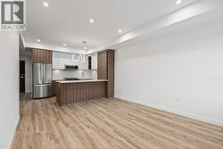 Kitchen, Dining & Living. Photo of a similar floorplan/different colour scheme in building - 