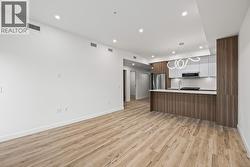 Kitchen, Dining & Living. Photo of a similar floorplan/different colour scheme in building - 