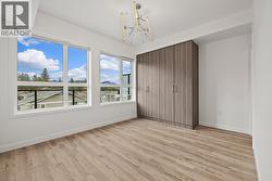 Primary Bedroom. Photo of a similar floorplan/different colour scheme in building - 