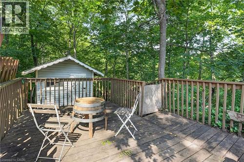 Wood-plank outdoor deck with wooden railings, surrounded by mature trees - 9 Leslie Drive, Hamilton, ON - Outdoor With Deck Patio Veranda