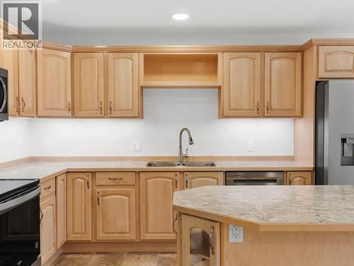 53 Wyvern Avenue, Whitehorse, YT - Indoor Photo Showing Kitchen With Double Sink