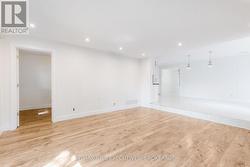 Family room Looking towards kitchen and den. - 
