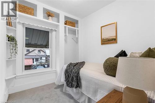 White-painted room featuring carpet flooring - 11 Ford Street, Hamilton, ON 