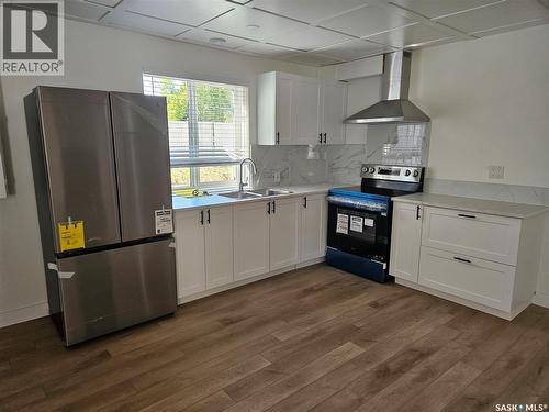 607 Addie Crescent, Saskatoon, SK - Indoor Photo Showing Kitchen With Double Sink