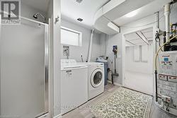 Laundry, utility and 2nd bathroom area - 