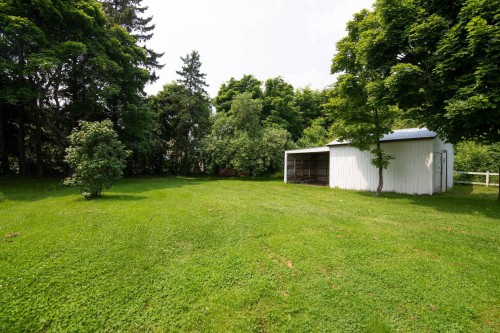 Remise - 530 Rue Blondeau, Saint-Pascal, QC - Outdoor With Backyard