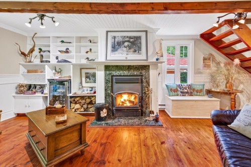 Salon - 401 Ch. Du Sommet, Fossambault-Sur-Le-Lac, QC - Indoor Photo Showing Living Room With Fireplace