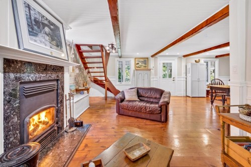 Salon - 401 Ch. Du Sommet, Fossambault-Sur-Le-Lac, QC - Indoor Photo Showing Living Room With Fireplace