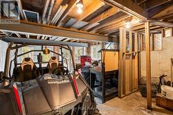 LOWER LEVEL DRIVE IN WORK SHOP - 