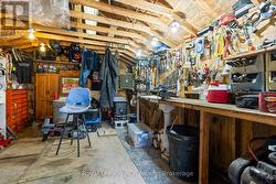 LOWER LEVEL DRIVE IN WORK SHOP - 