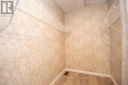 Primary Walk-In Closet - 