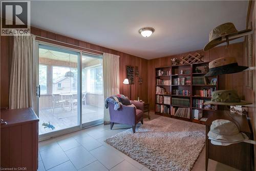 Room featuring paneled walls and light-toned tile flooring - 99 Lorraine Avenue, Kitchener, ON - Indoor