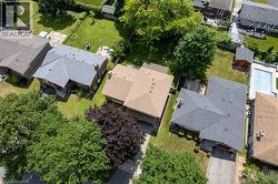 Single-family residence featuring a prominent gabled roofline and asphalt shingles - 
