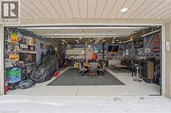 Garage featuring a heating unit - 