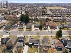 Aerial view of property and surrounding area with nearby suburban area - 