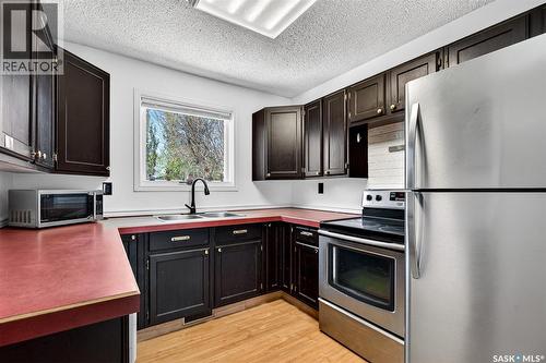 22 Edelweiss Crescent, Moose Jaw, SK - Indoor Photo Showing Kitchen With Double Sink