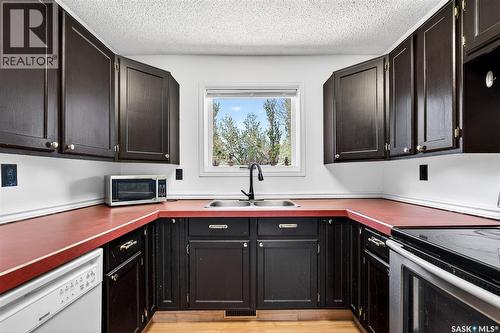 22 Edelweiss Crescent, Moose Jaw, SK - Indoor Photo Showing Kitchen With Double Sink