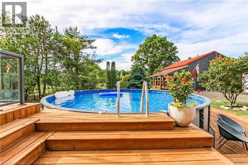 657 Windham Road 14 Road, Simcoe, ON - Outdoor With Above Ground Pool