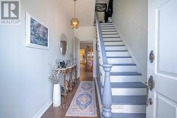 STAIRS TO UPPER APARTMENT - 